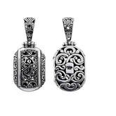 Handcrafted sterling silver fancy oval pendant with Bali scrollwork design, artisan necklace.